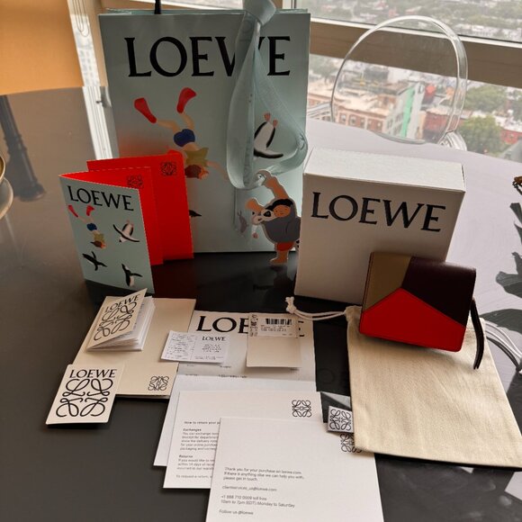 Puzzle compact zip wallet in classic calfskin - WITH COMPLETE GIFT PACKAGING - Picture 1 of 14